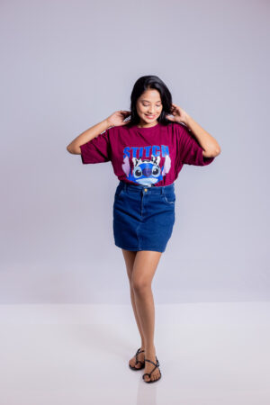 Oversize T-shirt worn by model with relaxed fit cotton fabric